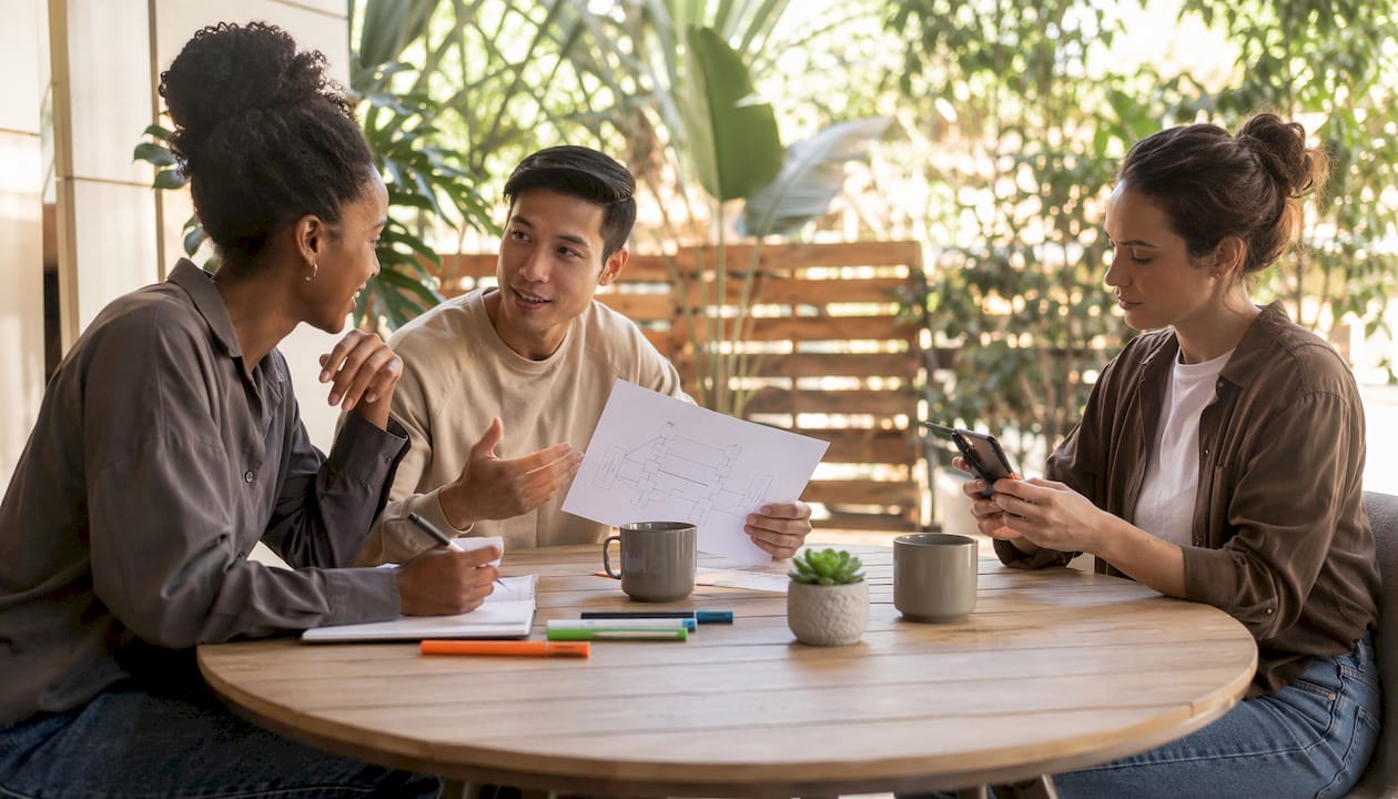 Ecommerce support team collaborating in workspace